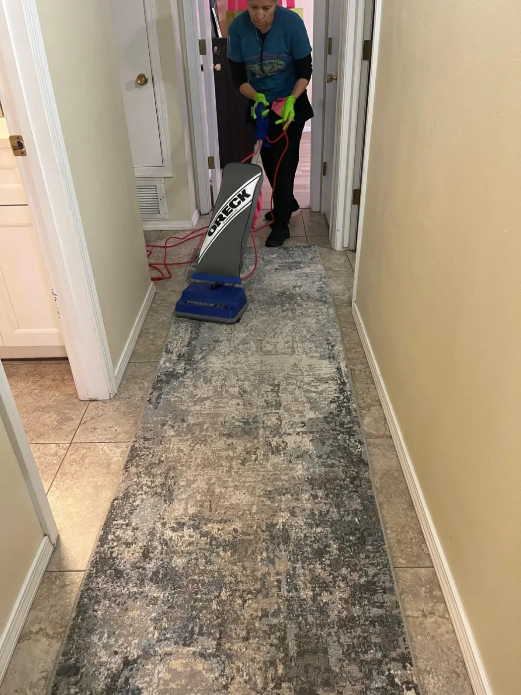 Sandia Green Clean team cleaning a Santa Fe home with eco-friendly products