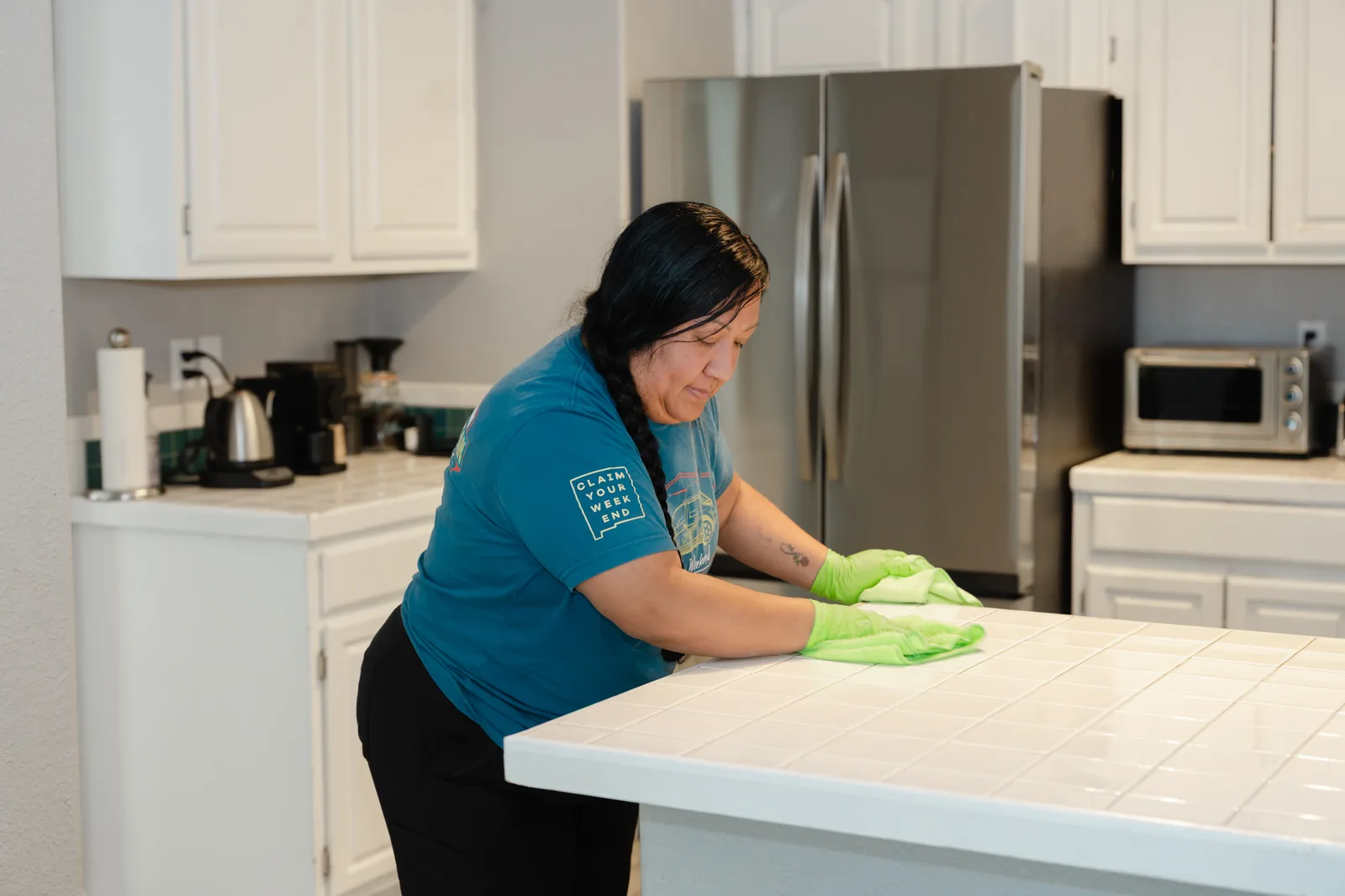Sandia Green Clean cleaner detailing a kitchen island countertop