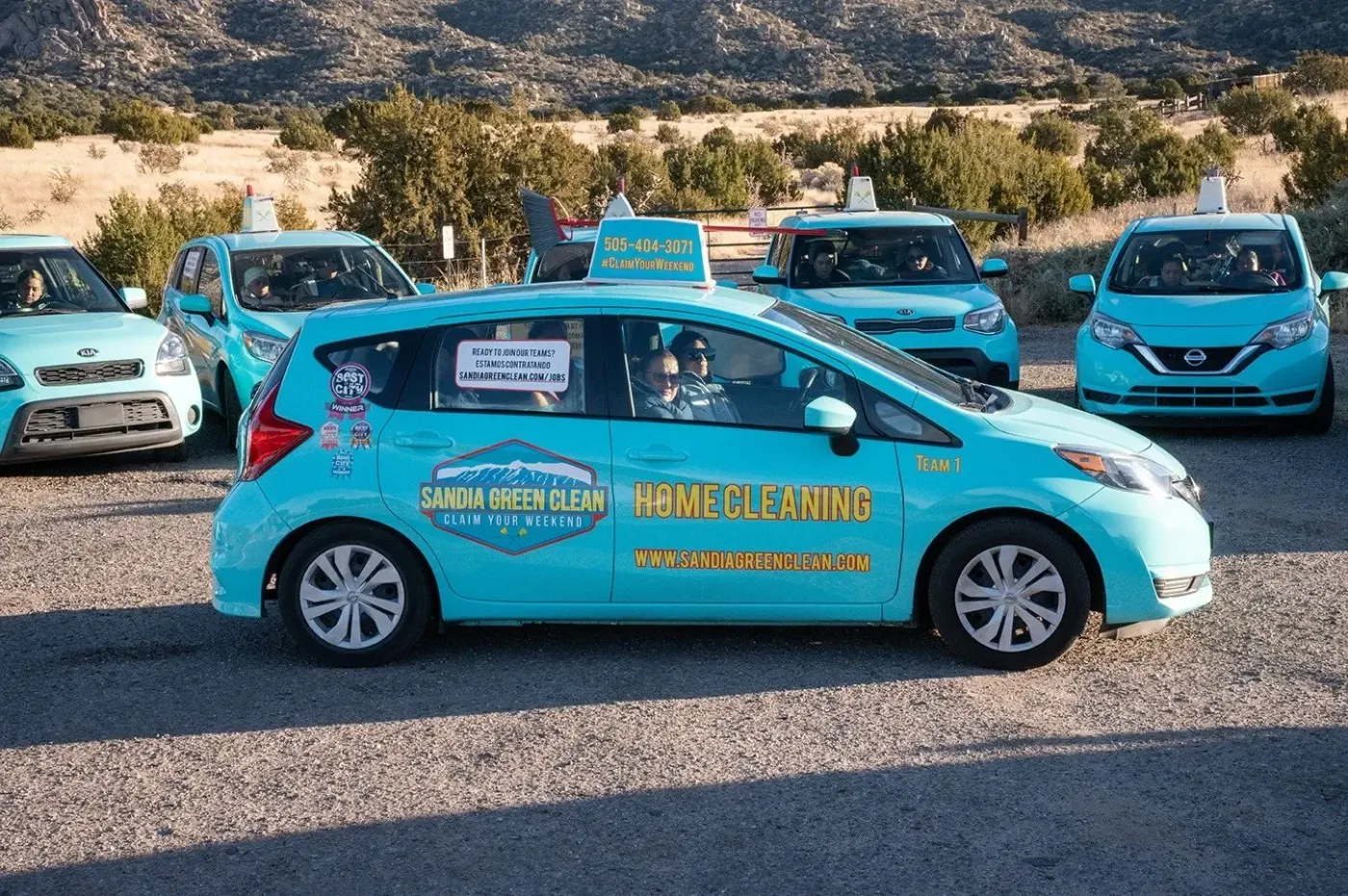 Sandia Green Clean branded New Mexico fleet car near Bernalillo